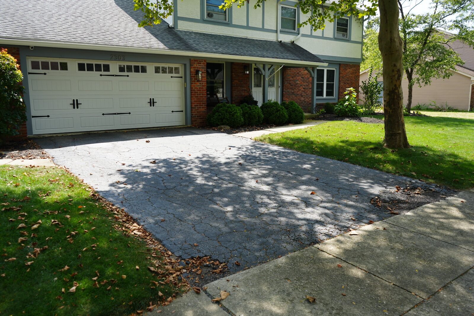 Original cracked driveway before work began