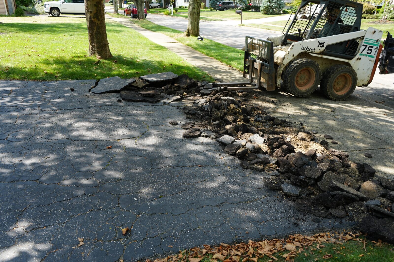 AR Empire crew beginning driveway removal