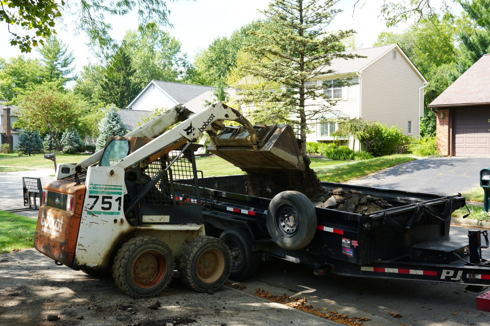 Old driveway being removed